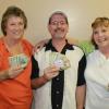 Novel Davis, Neil Haggard, Judy Stewart at the Friday Night Mixed League pot luck dinner.